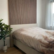 Ribbon-Wood Walnut slat wall in bedroom